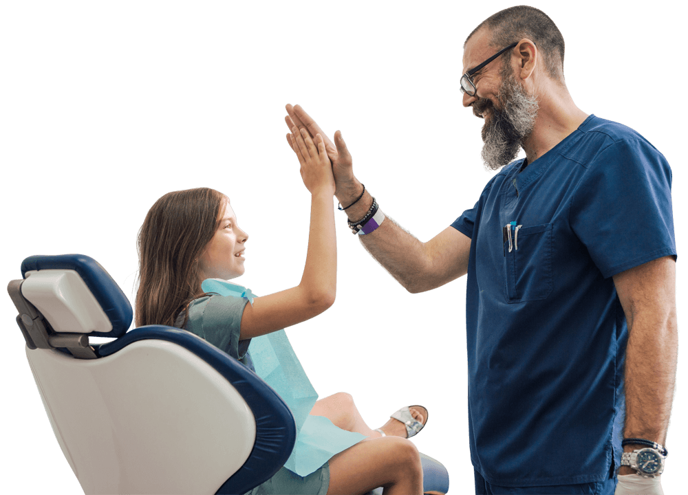 child-high-fiving-her-dentist